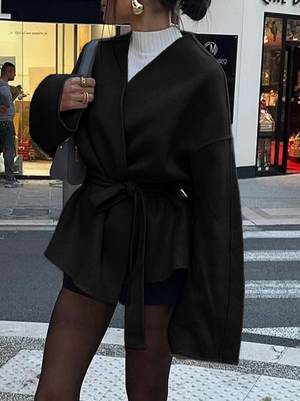 Short wrap coat with a deep V-neck and a self-tie belt in black