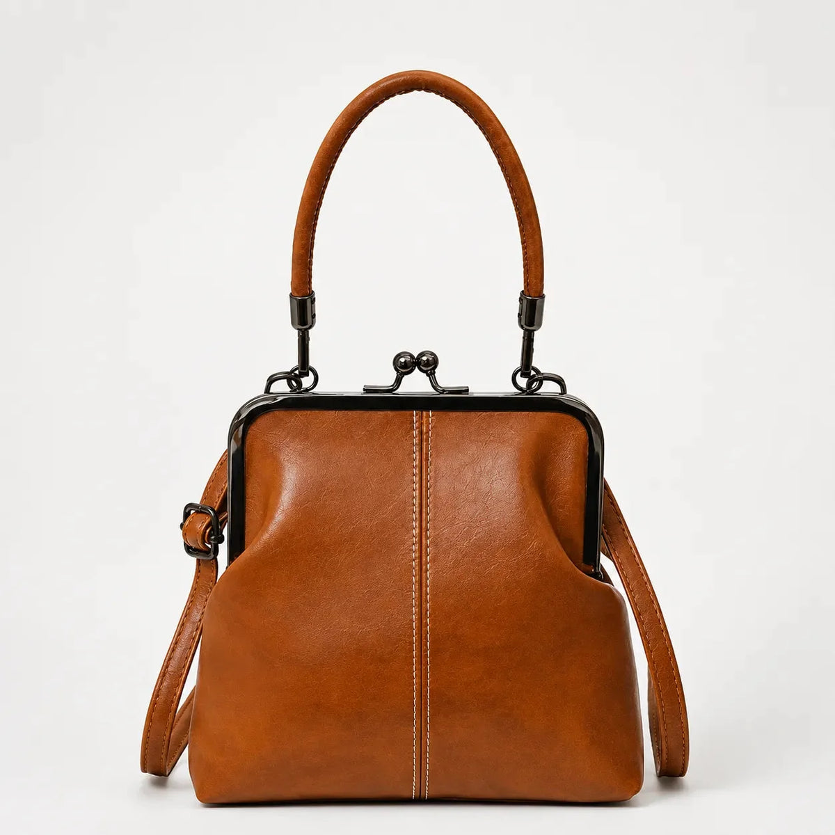 Women's kiss lock crossbody bag in Cognac Brown