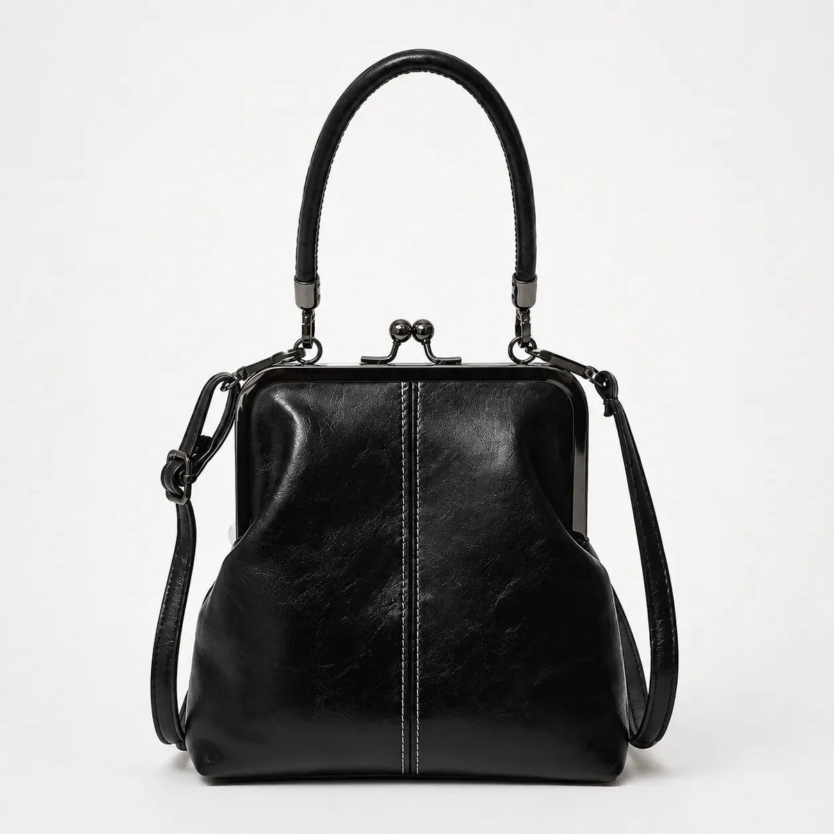 Women's kiss lock crossbody bag in Black