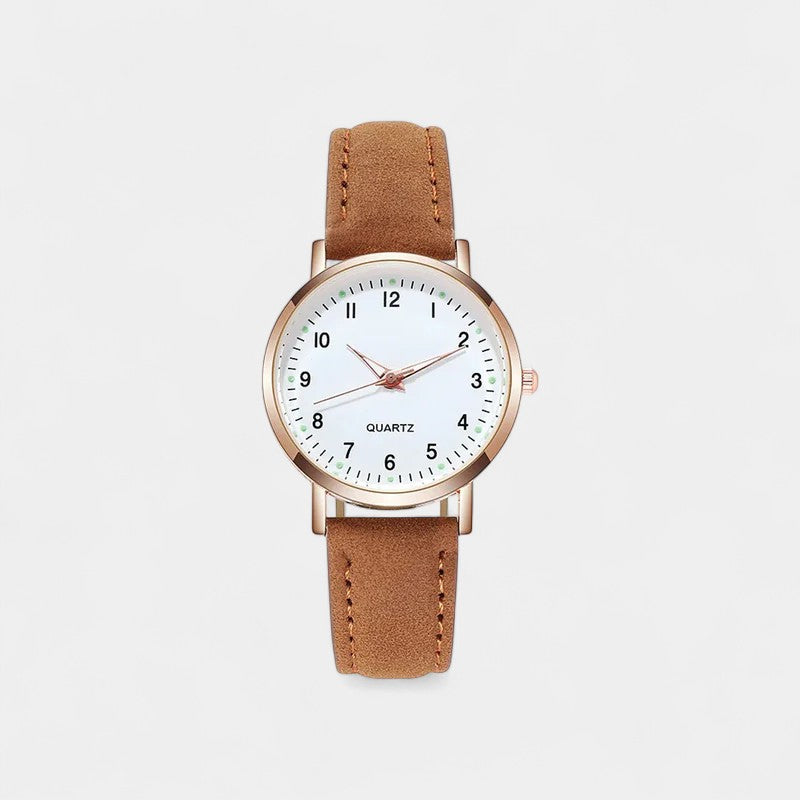 Watch with rose gold tone case and suede look strap