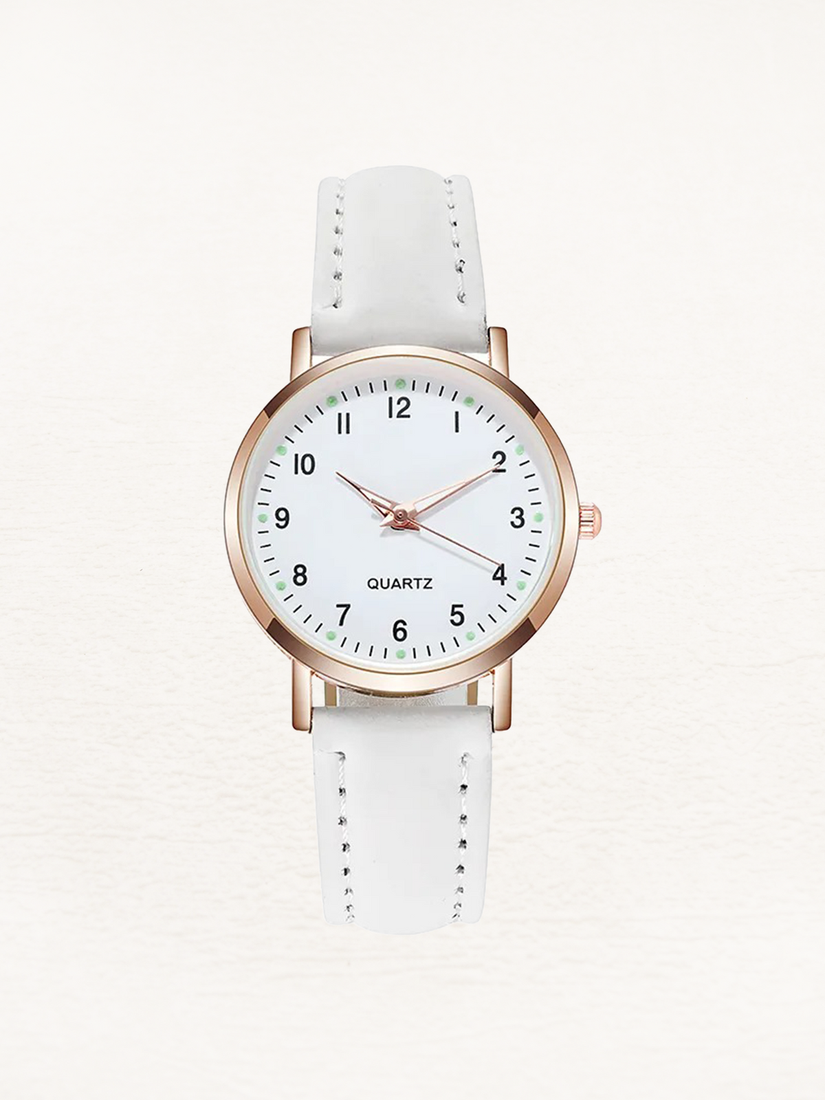 Watch with rose gold tone case and suede look strap