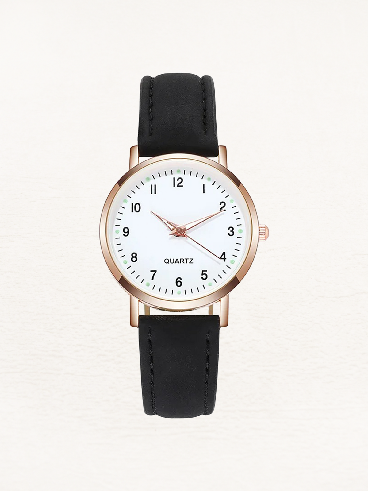 Watch with rose gold tone case and suede look strap