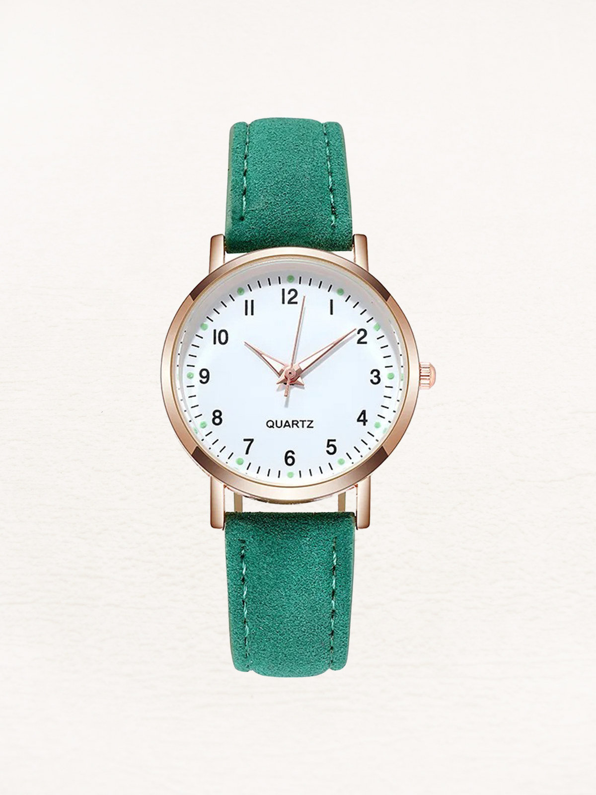 Watch with rose gold tone case and suede look strap