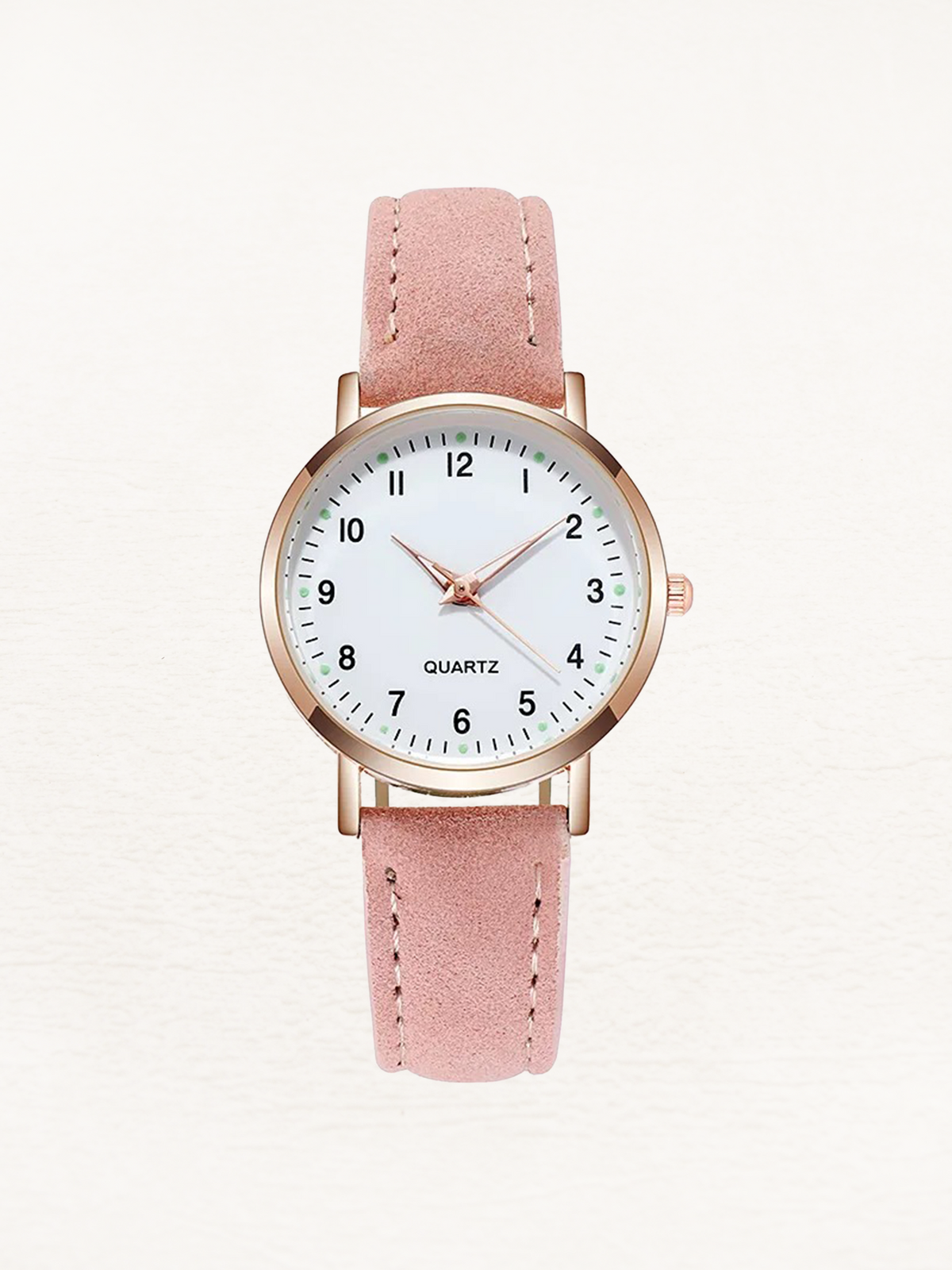 Watch with rose gold tone case and suede look strap