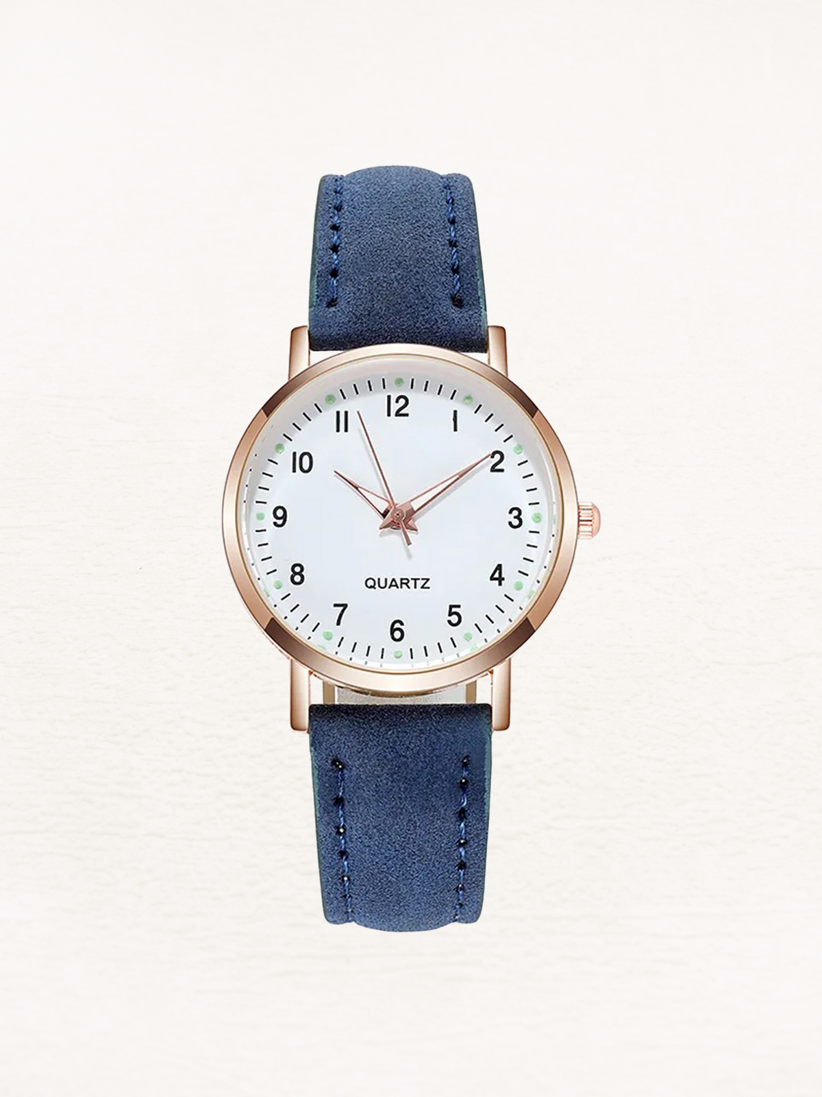 Watch with rose gold tone case and suede look strap