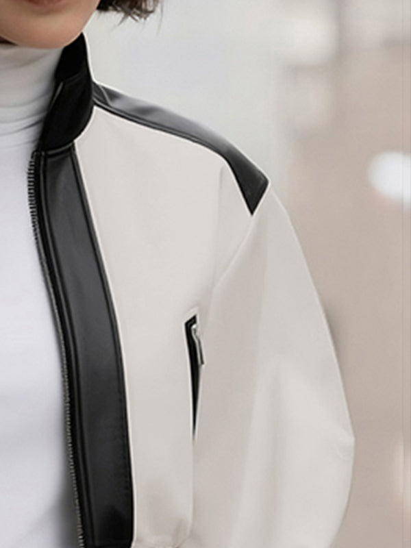 Cropped cream bomber jacket with black contrast panels and a zip front