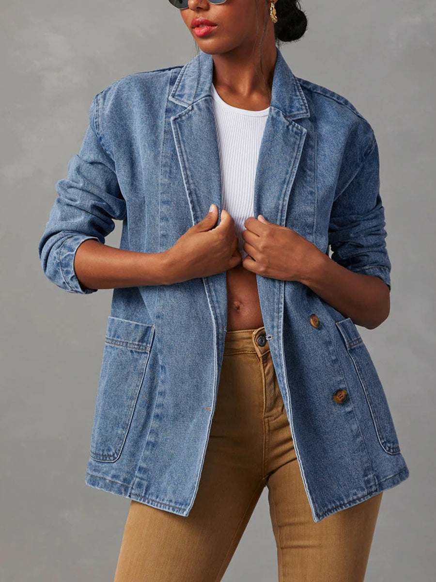 Mid wash denim blazer with a notched collar and four patch pockets in mid wash