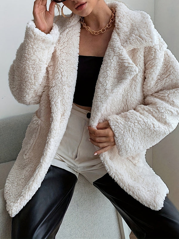 Cream teddy jacket in soft sherpa with a wide lapel and patch pockets