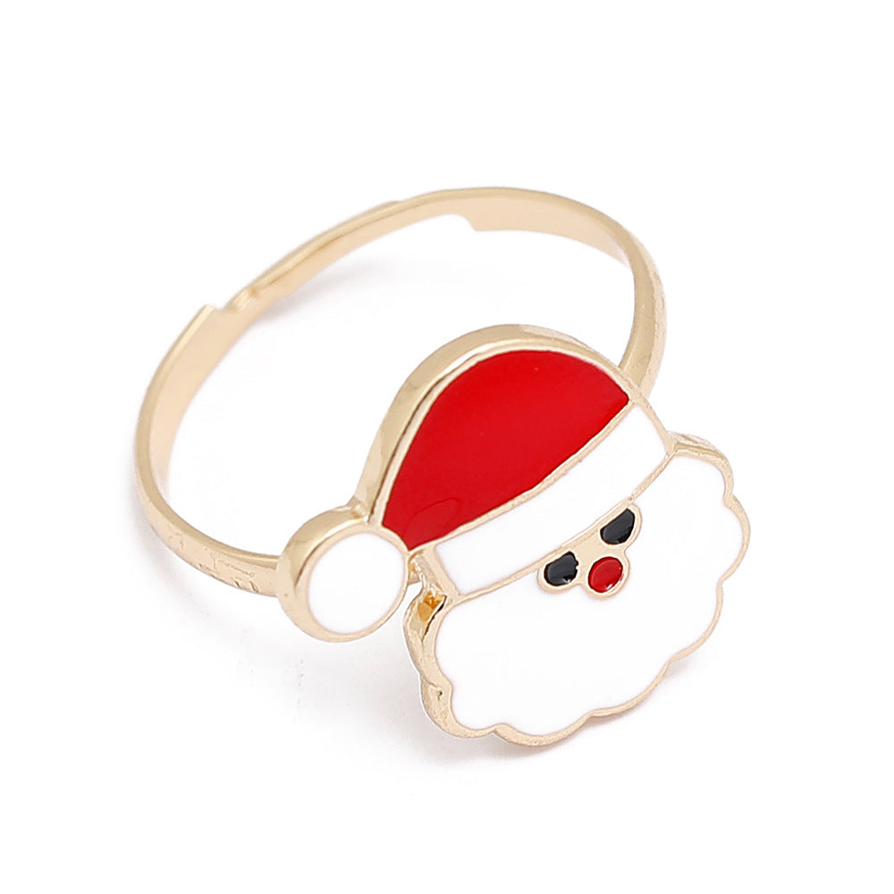 Adjustable gold-tone Christmas ring with an open band and a festive motif - father christmas face