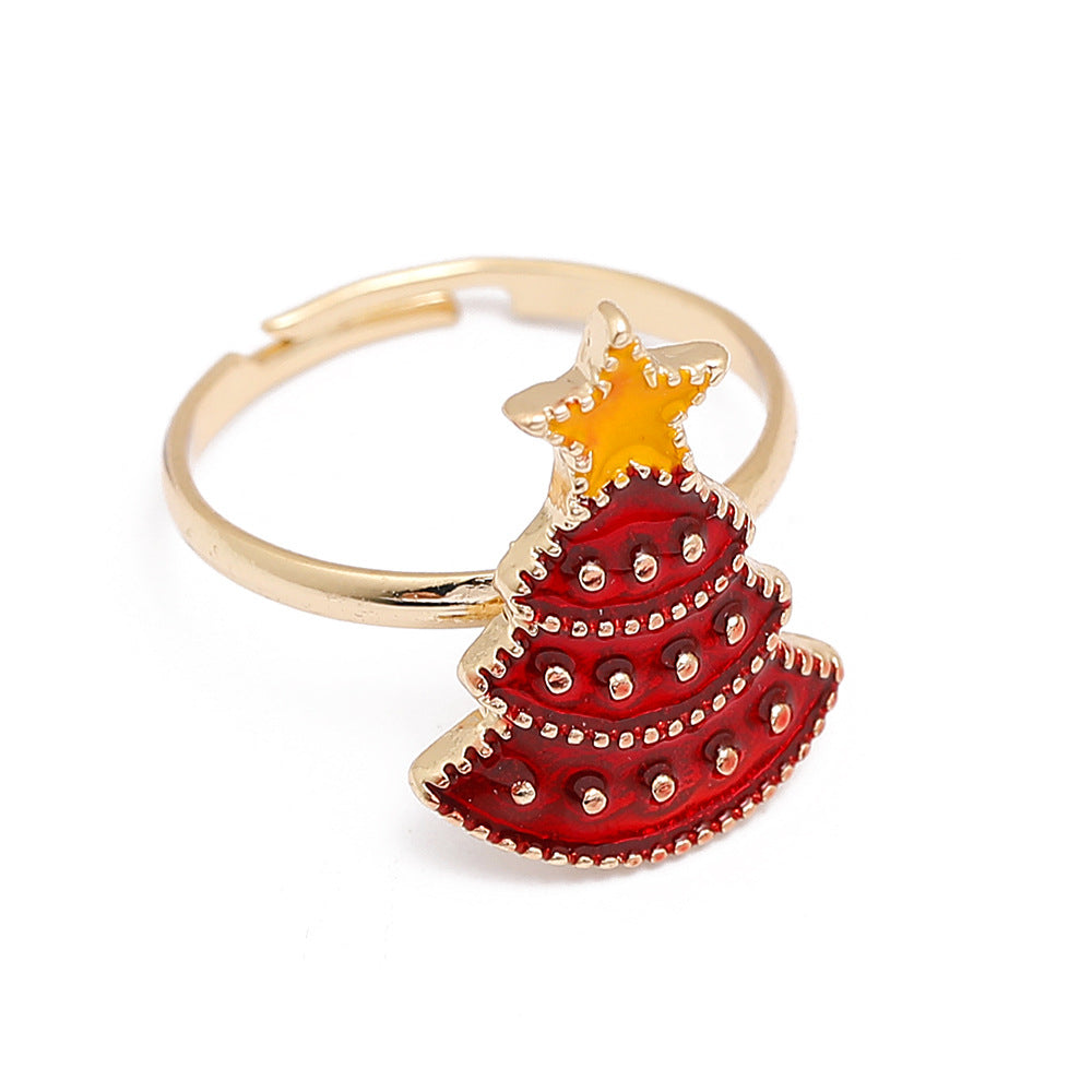 Adjustable gold-tone Christmas ring with an open band and a festive motif - red tree with star