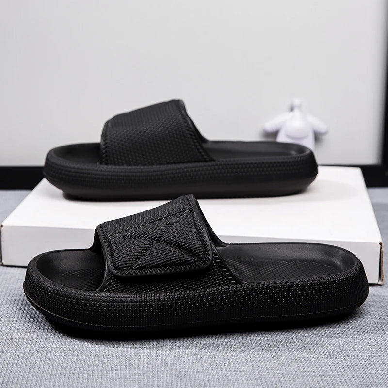 Sliders with a thick EVA sole and a wide hook-and-loop strap - black