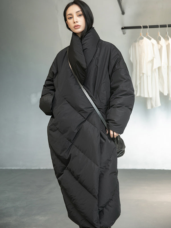 Long black padded coat with a scarf collar and diagonal quilting