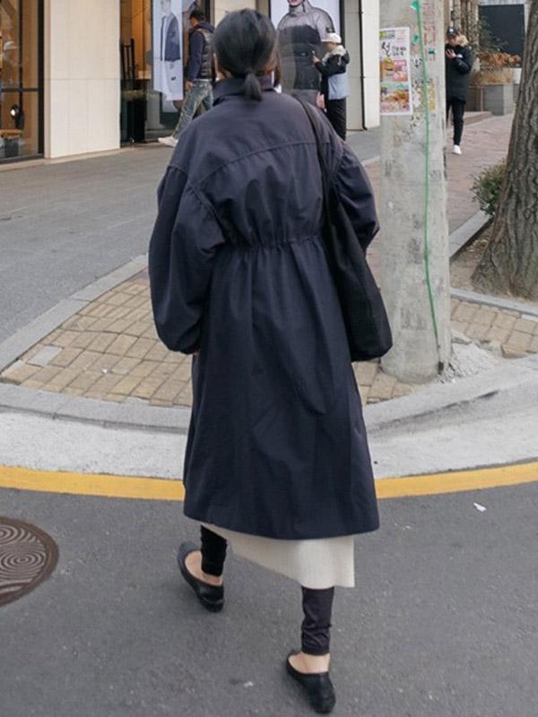 Longline hooded coat with a drawstring waist and deep pockets