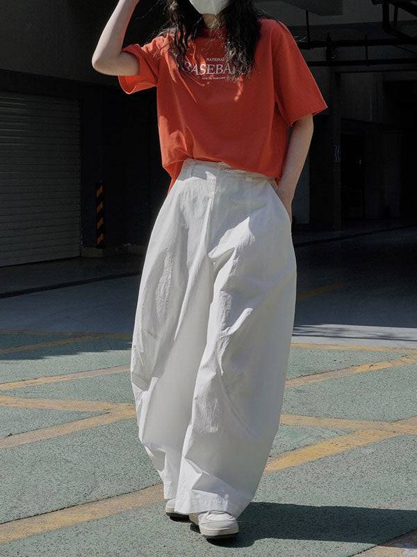 Wide-leg barrel trousers in cotton with curved knee seams