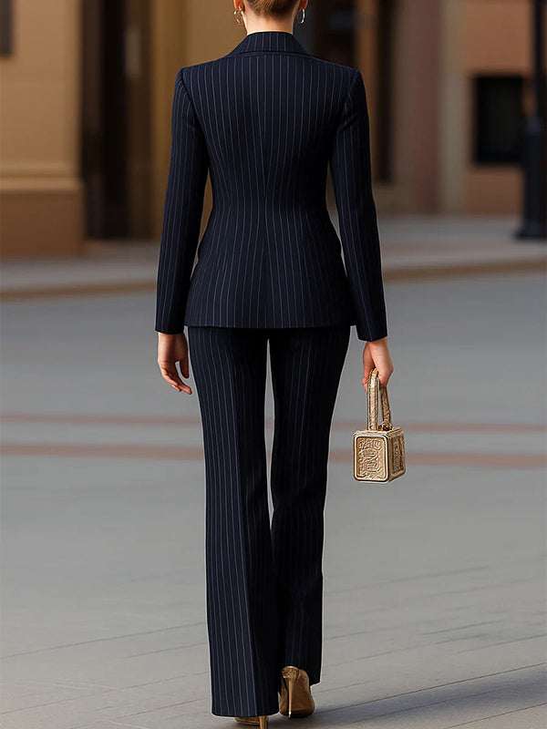 Navy pinstripe blazer with a peak lapel and gold-tone buttons