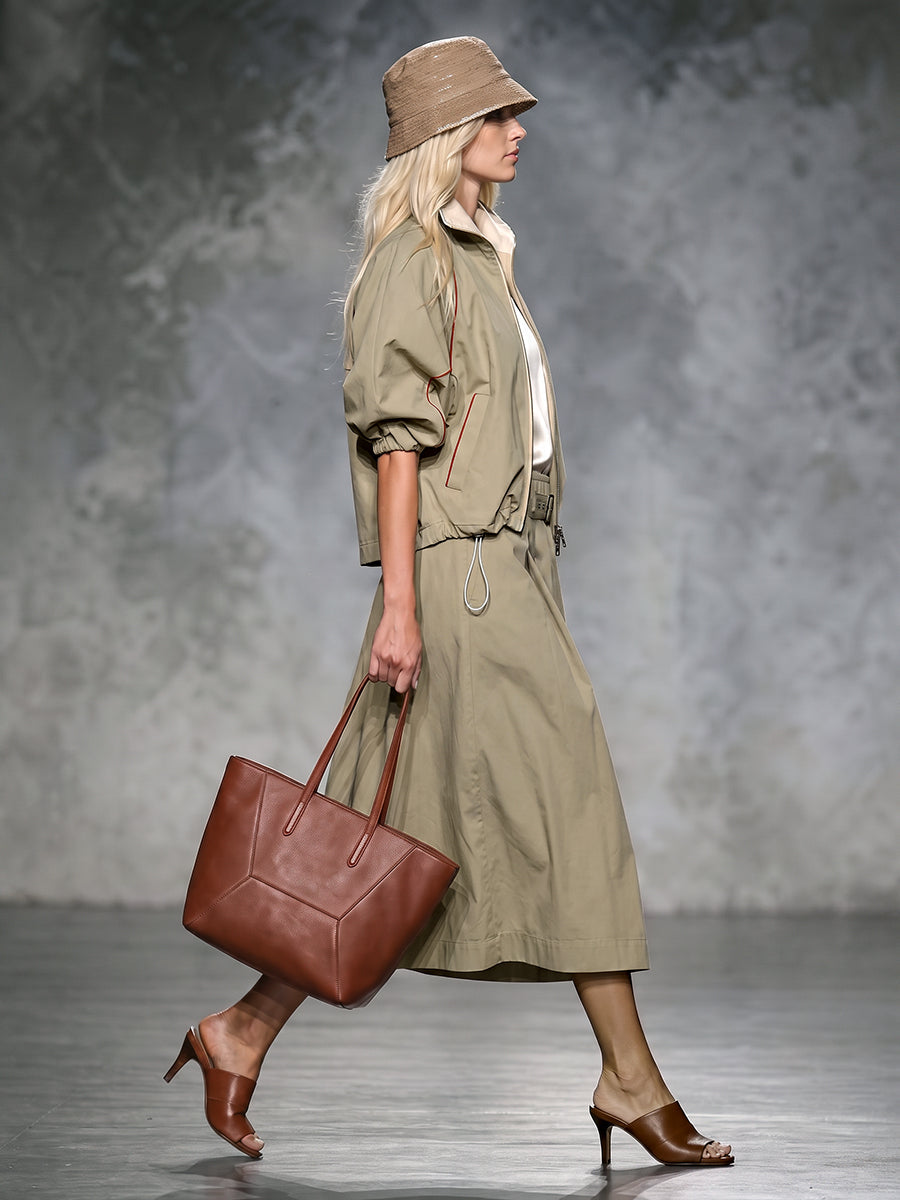 Khaki jacket with rust contrast piping and gathered puff sleeves