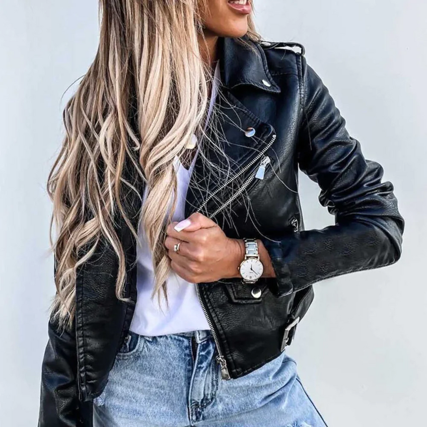 Women's fitted faux leather biker jacket with an angled zip and belt