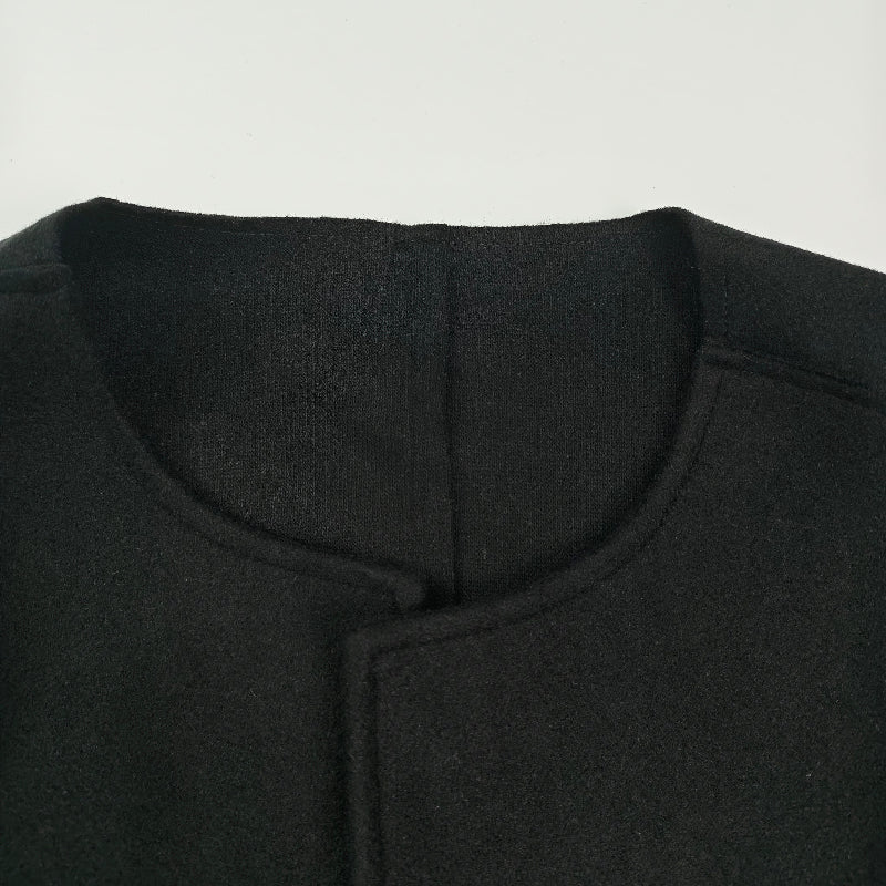 Collarless longline coat with dropped sleeves and an open front