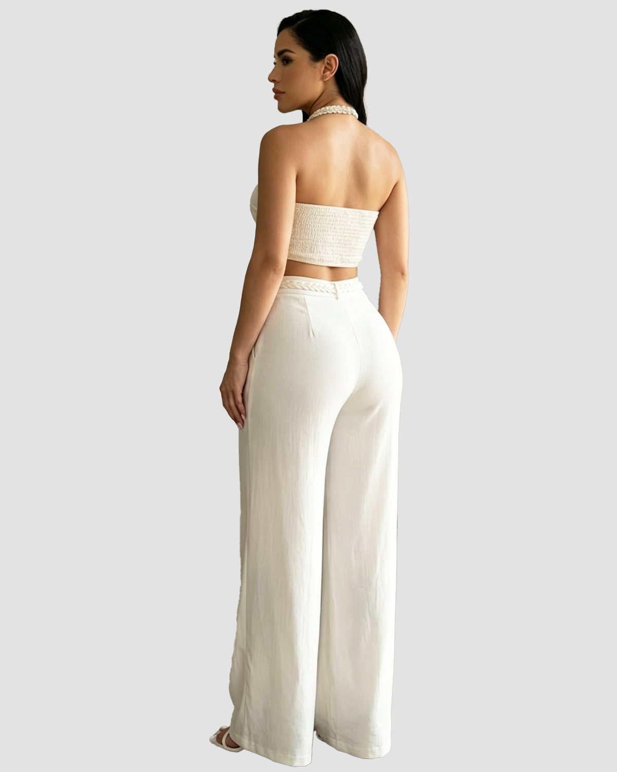Two-piece set with a braided halter crop top and high-waisted wide-leg trousers