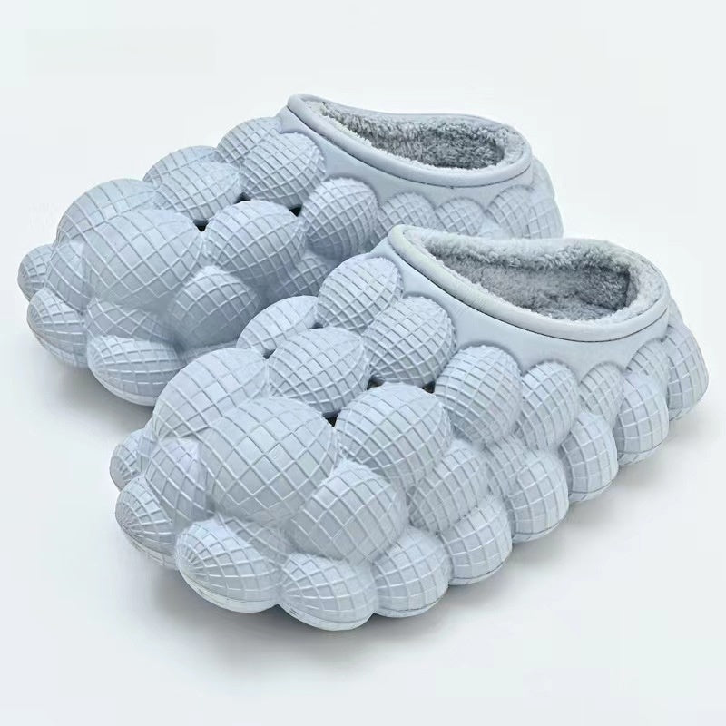 Bubble slides in EVA with round bubbles over the whole upper and a plush lining - light blue