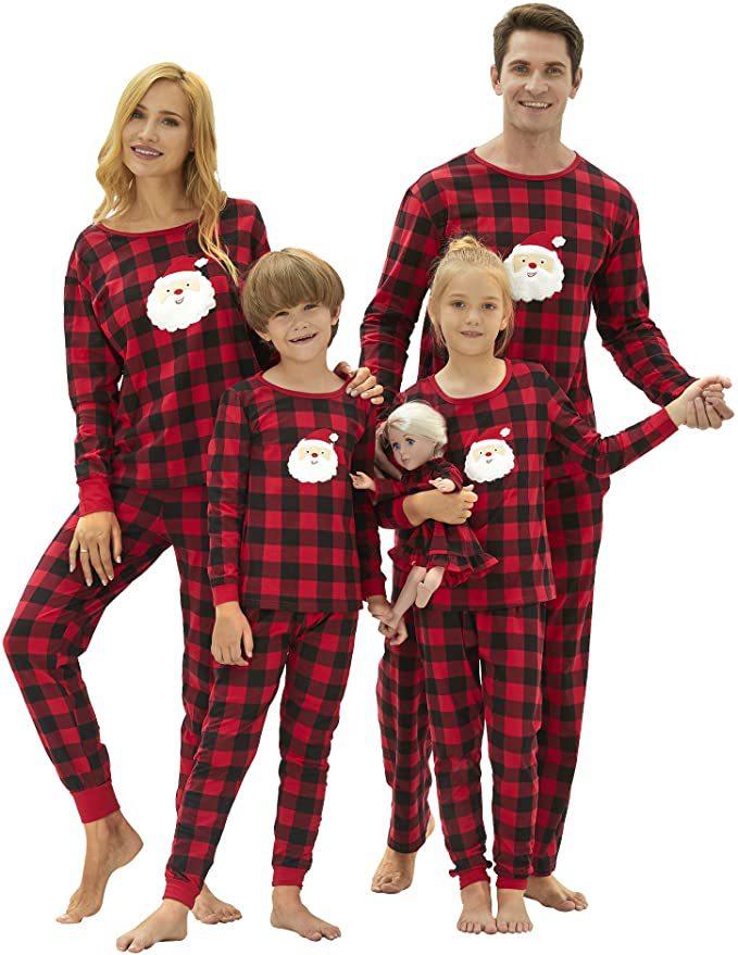 Red and black check family Christmas pyjamas with a Father Christmas face