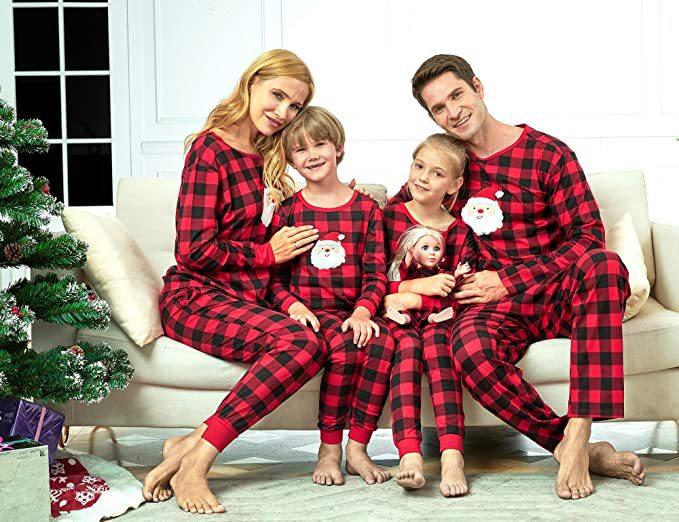 Red and black check family Christmas pyjamas with a Father Christmas face