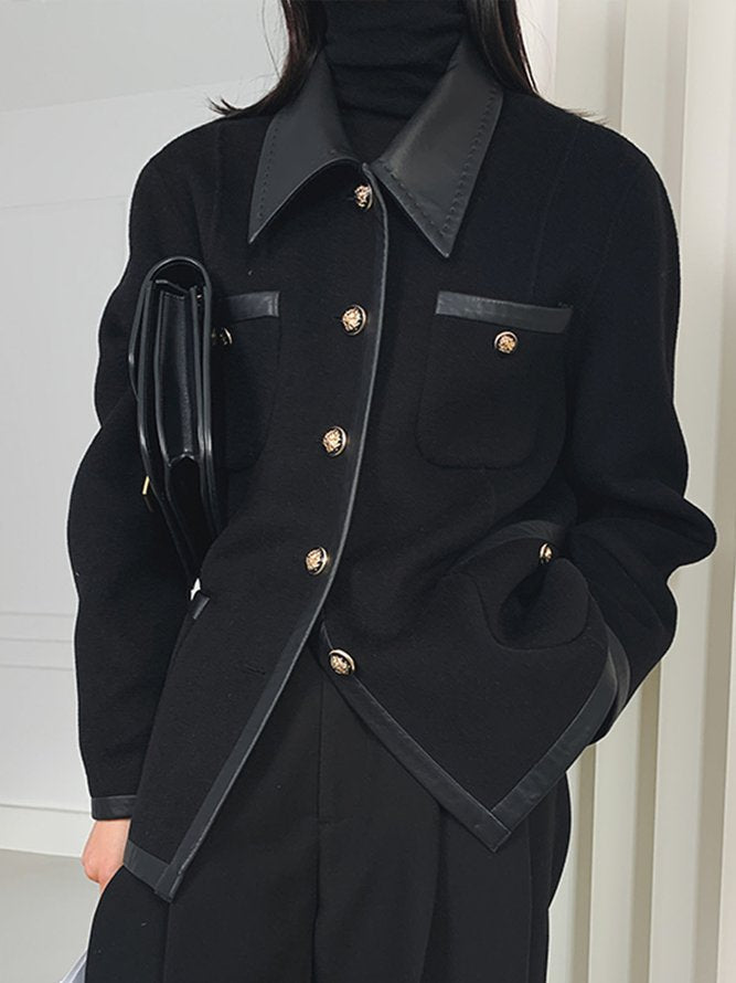 Black jacket with faux leather trim and gold-tone buttons
