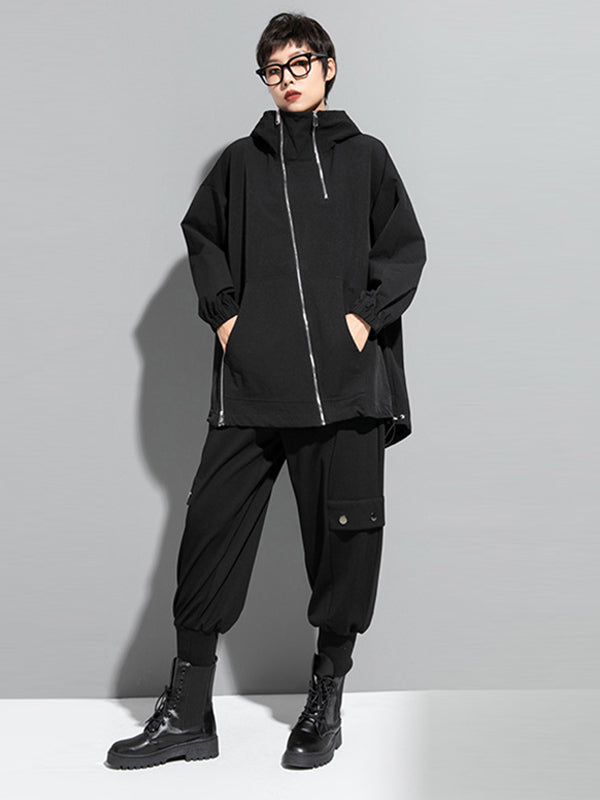 Oversized black hooded jacket with an off-centre zip and drawstring hem