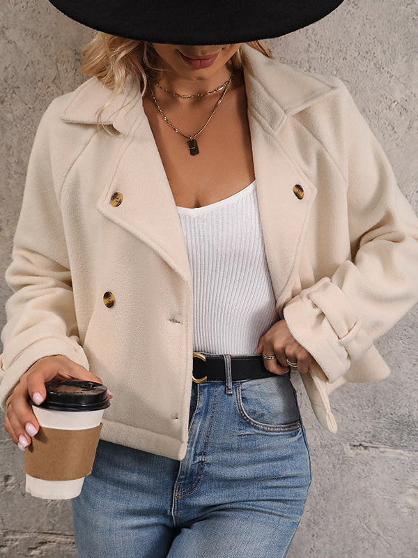 Cream cropped fleece jacket with a wide lapel and two rows of buttons