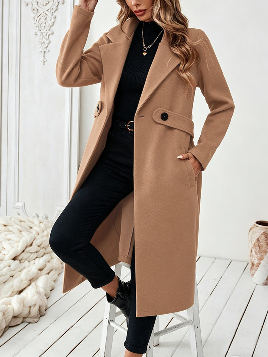 Longline coat with a wide notch lapel and a button at the waist