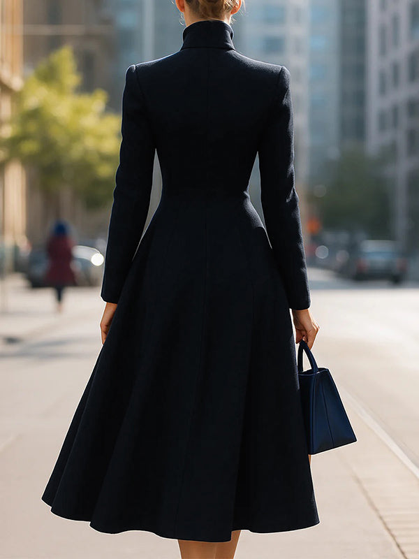 Navy A-line coat with stand collar and off-centre button front