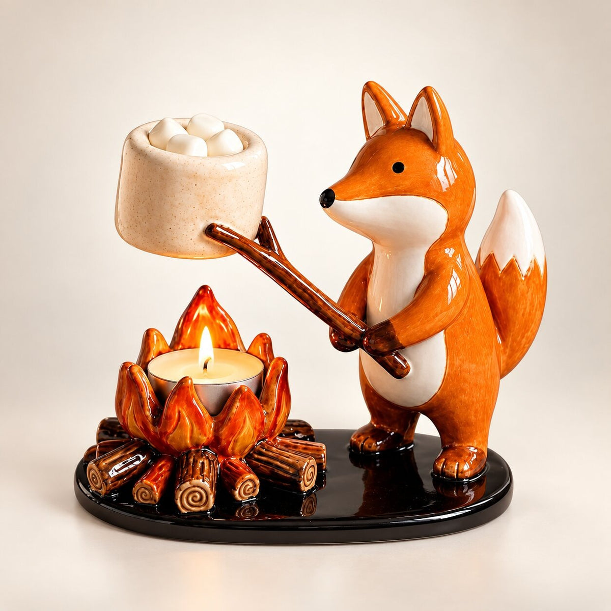Tea light holder with an animal roasting a treat over a little campfire - fox