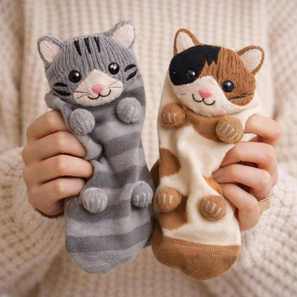 Socks with a knitted 3D animal head with ears and little paws on the foot - cats