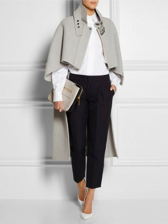 Grey wool-look cape with a stand collar and two buckle tabs