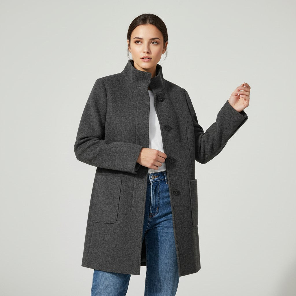 Knee-length single-breasted coat with a stand collar and patch pockets in dark grey