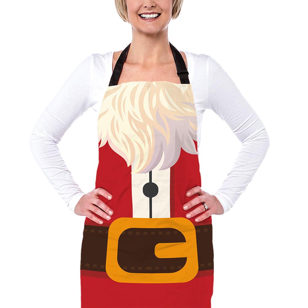 Christmas apron with a black neck strap and a festive print across the front - santa suit with belt