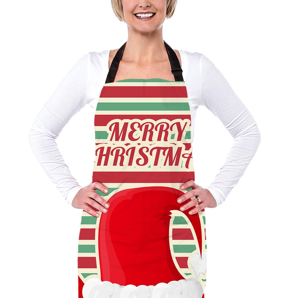 Christmas apron with a black neck strap and a festive print across the front - stripes with santa hat