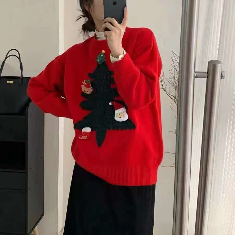 Women's knitted Christmas jumper with a raised 3D tree and small appliqués
