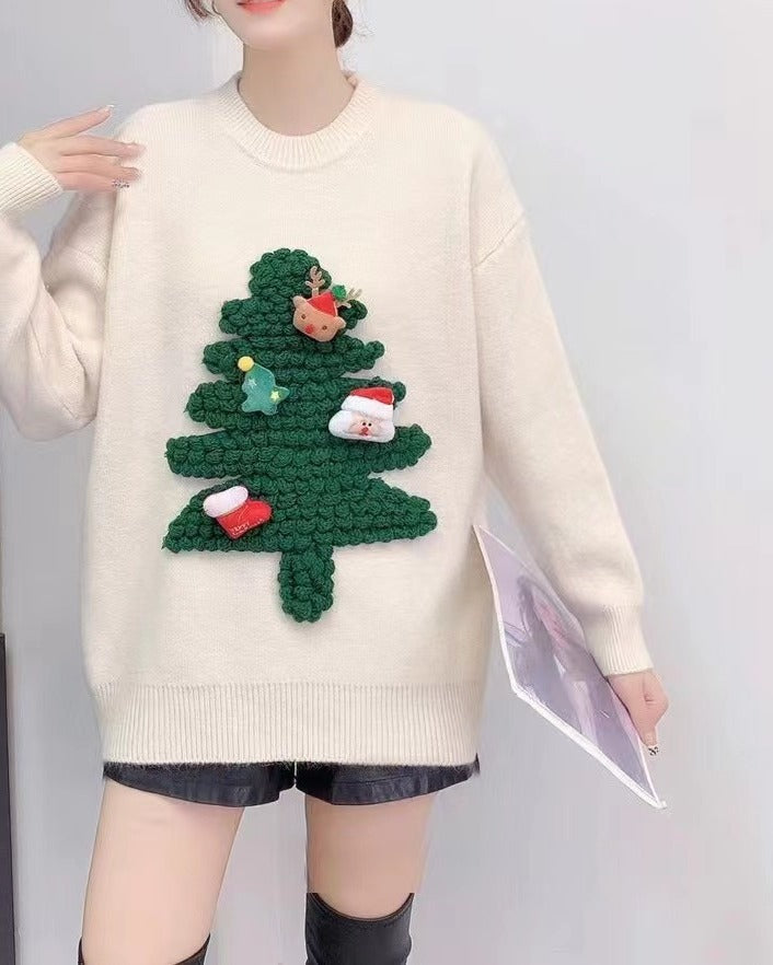 Women's knitted Christmas jumper with a raised 3D tree and small appliqués