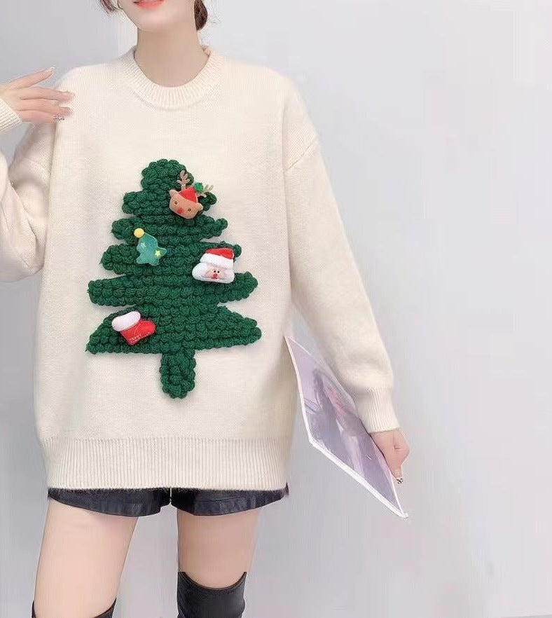 Women's knitted Christmas jumper with a raised 3D tree and small appliqués