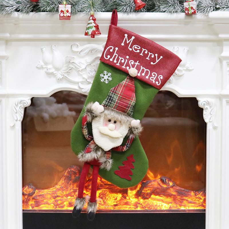 Large Christmas stocking with a dangling-leg character and Merry Christmas cuff - father christmas
