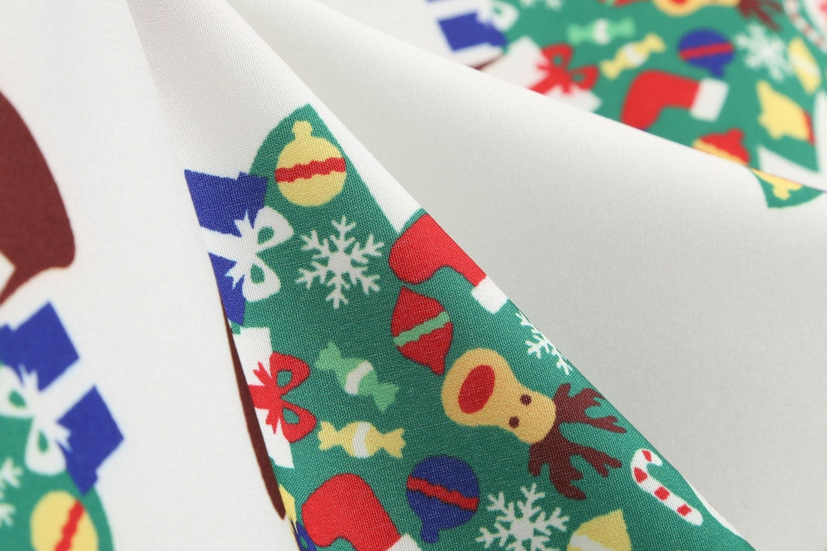 Women's Christmas swing dress with black bodice, bow belt and festive print