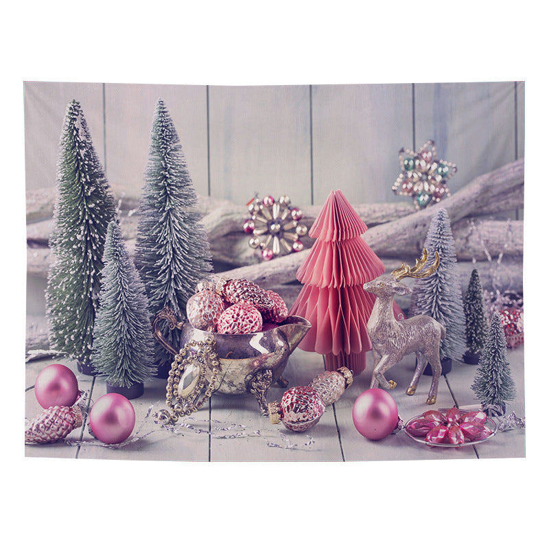 Christmas wall tapestry with a festive scene hanging on the wall - pink christmas trees