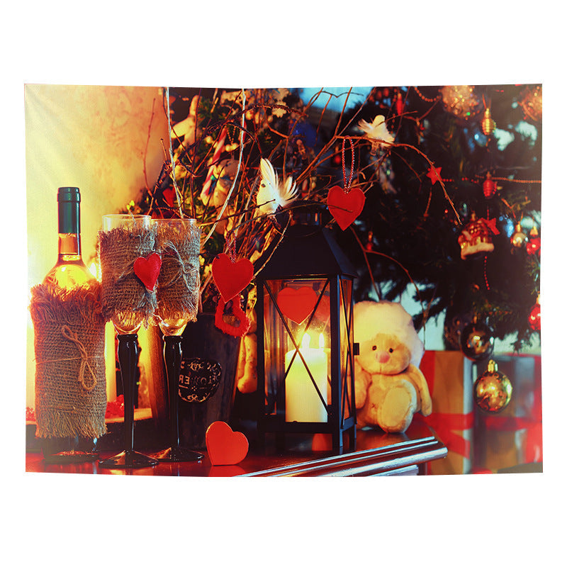 Christmas wall tapestry with a festive scene hanging on the wall - lantern and teddy bear