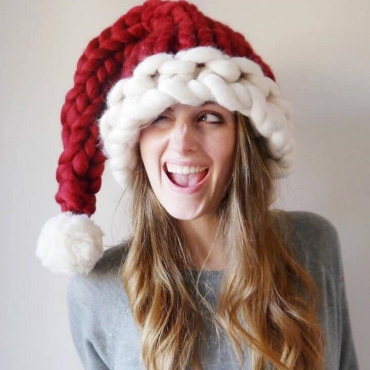 Chunky knit Christmas hat with a thick white trim and white pompom - wine red