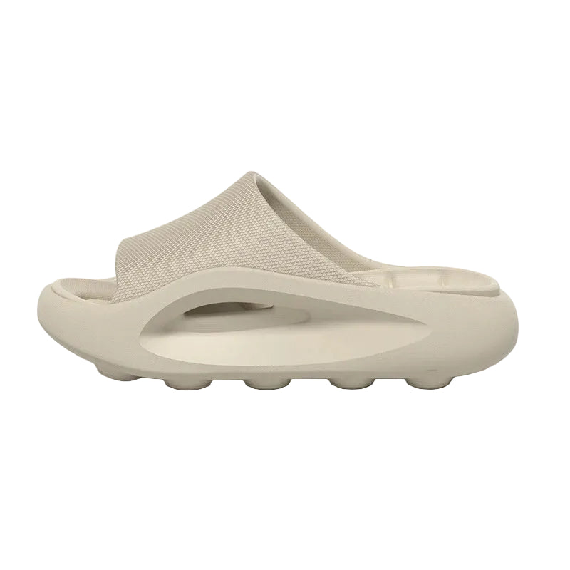 EVA sliders with a thick sole, contoured footbed and wide band across the instep - view 2