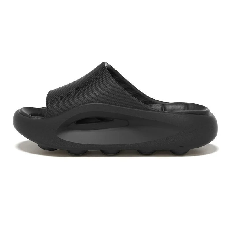EVA sliders with a thick sole, contoured footbed and wide band across the instep - black
