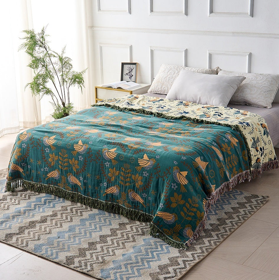 Cotton throw with a Scandinavian bird pattern and fringe - view 2