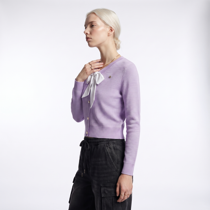 Women's cropped cardigan with a white bow at the V-neck and pearl-look buttons