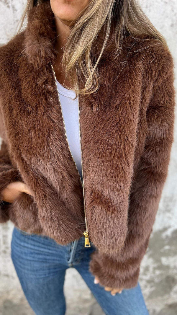 Women's cropped faux fur jacket with a stand collar and gold-tone zip